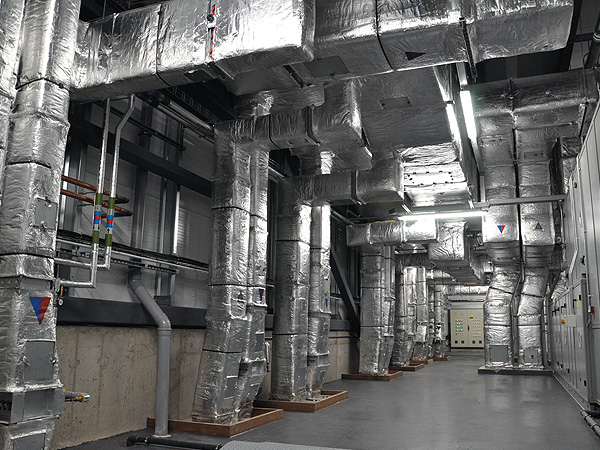 Insulated ductwork and pipework in a large plant space